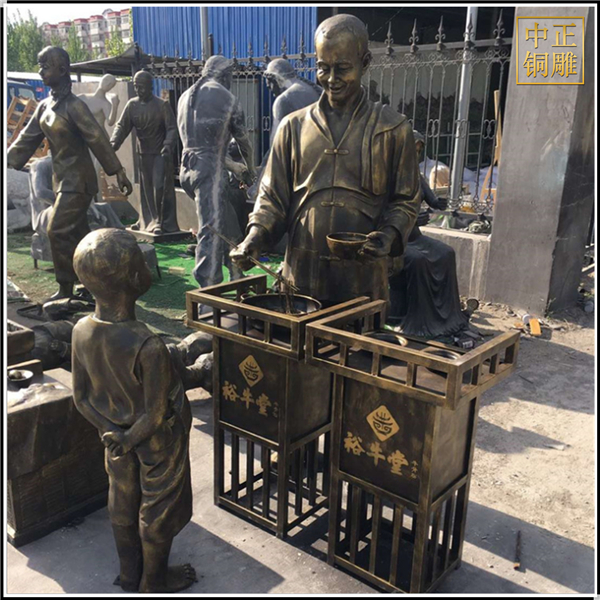現代步行街飯店門口人物銅雕塑.jpg